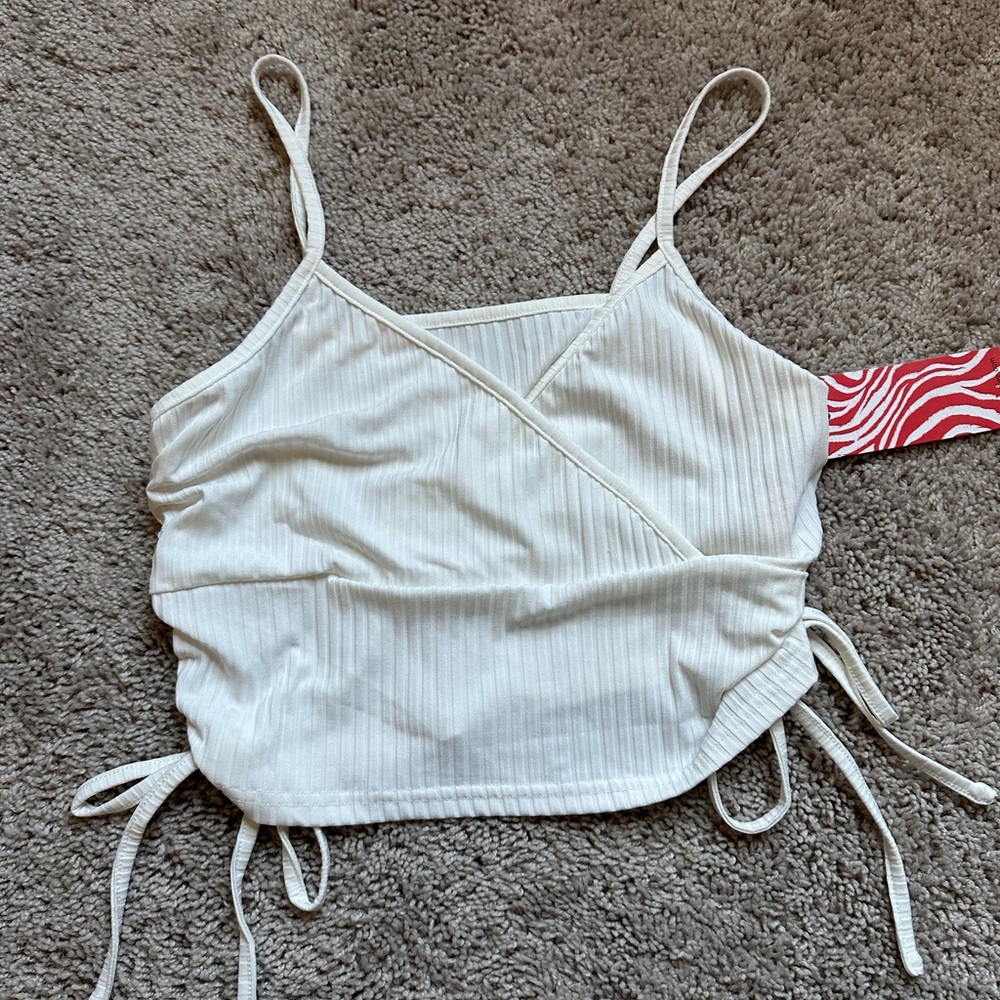 White cross V-neck crop top.